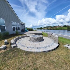 Outdoor Fire Pit Design - Myrtle Beach Pavers used to create a stunning back patio with fire pit. Hardscape's done in Myrtle Beach